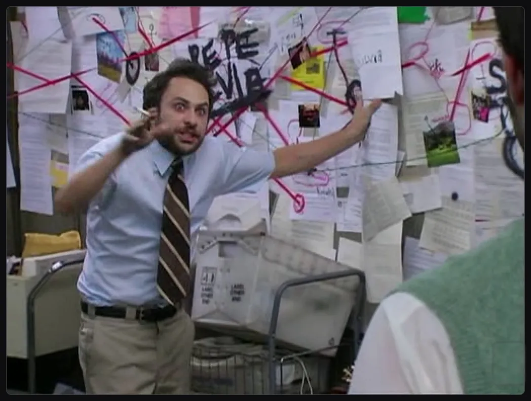 A meme from the series It's Always Sunny In Philadelphia illustrating how chaotic some Dockerfiles might seem.